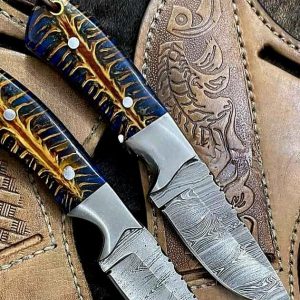 Custom handmade Damascus steel cowboy skinner knife.