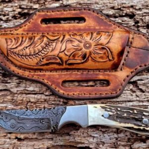 Custom handmade Damascus steel cowboy skinner knife.